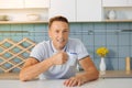 Cheerful happy man enjoying his drink Royalty Free Stock Photo