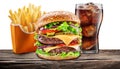 Delicious cheeseburger with cola and potato fries on the white background. Fast food concept. File contains clipping path