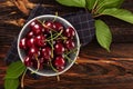 Delicious cherries in bowl from above.