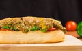 Delicious Chicken Burger Steak Supreme with Lettuce And Tometo Served on Wooden Table