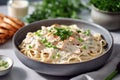delicious chicken and pasta dish placed on sleek gray background, composition exudes warmth and comfort, with rich tones Royalty Free Stock Photo