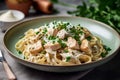 delicious chicken and pasta dish placed on sleek gray background, composition exudes warmth and comfort, with rich tones