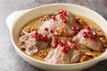 Delicious chicken stew in pomegranate walnut sauce close-up in a plate. Horizontal Royalty Free Stock Photo