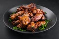 Delicious chicken wings with special marinade Royalty Free Stock Photo