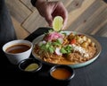 Delicious chilaquiles with birria Mexican style