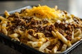 Delicious chili cheese fries in a takeout container Royalty Free Stock Photo