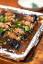 A delicious Chinese dish, teppanyaki eggplant stuffed with meat