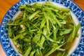 A delicious Chinese home-style dish, fried water spinach Royalty Free Stock Photo