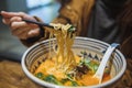 Delicious chinese ramen with pork and vegetarian soup with turmeric. Royalty Free Stock Photo