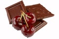 Delicious choco- chocolate blocks with fresh cherries Royalty Free Stock Photo