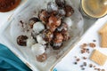 Delicious Chocolate Balls - various types served on white background with coffee Royalty Free Stock Photo