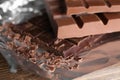 Delicious chocolate bars on foil, closeup Royalty Free Stock Photo