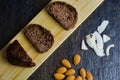 Delicious Chocolate bread brownie and cakes with chocolate and almonds slices on black background. Selective focus. Top view. Home Royalty Free Stock Photo