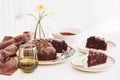 Delicious chocolate cake brownie with cherries on white wooden table Royalty Free Stock Photo