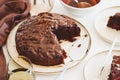Delicious chocolate cake brownie with cherries on white wooden table Royalty Free Stock Photo