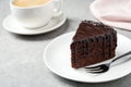 Delicious chocolate cake on grey table Royalty Free Stock Photo