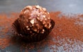 Delicious chocolate candy ball with filling and nuts Royalty Free Stock Photo