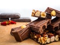 Delicious chocolate and Italian hazelnut nougat, cut into pieces, for a sea of sweetness Royalty Free Stock Photo