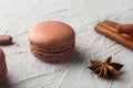 Delicious chocolate macaron on grey table Royalty Free Stock Photo