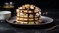 Delicious chocolate pancakes decorated with nuts