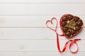 Delicious chocolate pralines in red box for Valentine's Day. Heart shaped box of chocolates top view with copy space Royalty Free Stock Photo