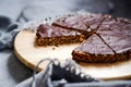 delicious chocolate tart with crunchy base in window light, equals foodporn