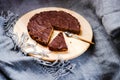 delicious chocolate tart with crunchy base in window light, equals foodporn