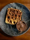 Delicious chocolate waffle with hazelnut Royalty Free Stock Photo
