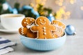 Delicious Christmas cookies in bowl on light table Royalty Free Stock Photo