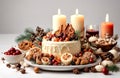 Delicious christmas food and candle on white background