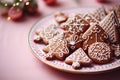 Delicious Christmas gingerbread cookies with pink icing for a sweet holiday Royalty Free Stock Photo