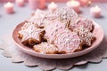 Delicious Christmas gingerbread cookies with pink icing for a sweet holiday Royalty Free Stock Photo