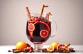 Delicious christmas hot mulled wine with fruits and spices on white background