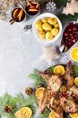 Christmas dinner with roasted meat steak, Christmas Wreath salad, baked potato, grilled vegetables, cranberry sauce