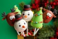 Delicious Christmas themed cake pops on blurred background, closeup Royalty Free Stock Photo