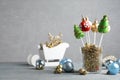 Delicious Christmas cake pops and festive decor on wooden table against grey background. Space for text Royalty Free Stock Photo