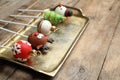 Delicious Christmas themed cake pops on wooden table, closeup Royalty Free Stock Photo