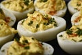 Delicious close-up photograph of Devilled Eggs with paprika