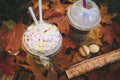 Delicious cocoa with marshmallows and a tube with condensed milk Royalty Free Stock Photo