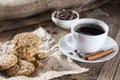 Delicious coffee with sweets on a wooden table