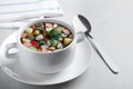 Delicious cold okroshka with kvass served on grey table. Traditional Russian summer soup Royalty Free Stock Photo
