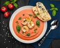 Delicious cold tomato soup or gazpacho with shrimps