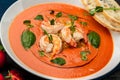 Delicious cold tomato soup or gazpacho with shrimps