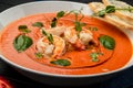 Delicious cold tomato soup or gazpacho with shrimps