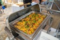 delicious and colorful fish covered in mango salsa in a catering tray at fine dining event