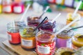 Delicious colorful jam, jelly or confiture in little glass jar