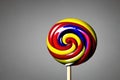 Delicious colorful rainbow lollipop closeup, candy stick, party popsicle, snack food illustration, ai generative