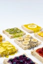 Delicious colourful minimal mix fruits jam on sliced bread. Set on white background Royalty Free Stock Photo