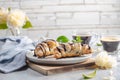 Delicious continental breakfast with fresh flaky french croissants and coffee, close up on the croissants Royalty Free Stock Photo
