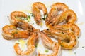 Delicious cooked prawn plate served with olive oil